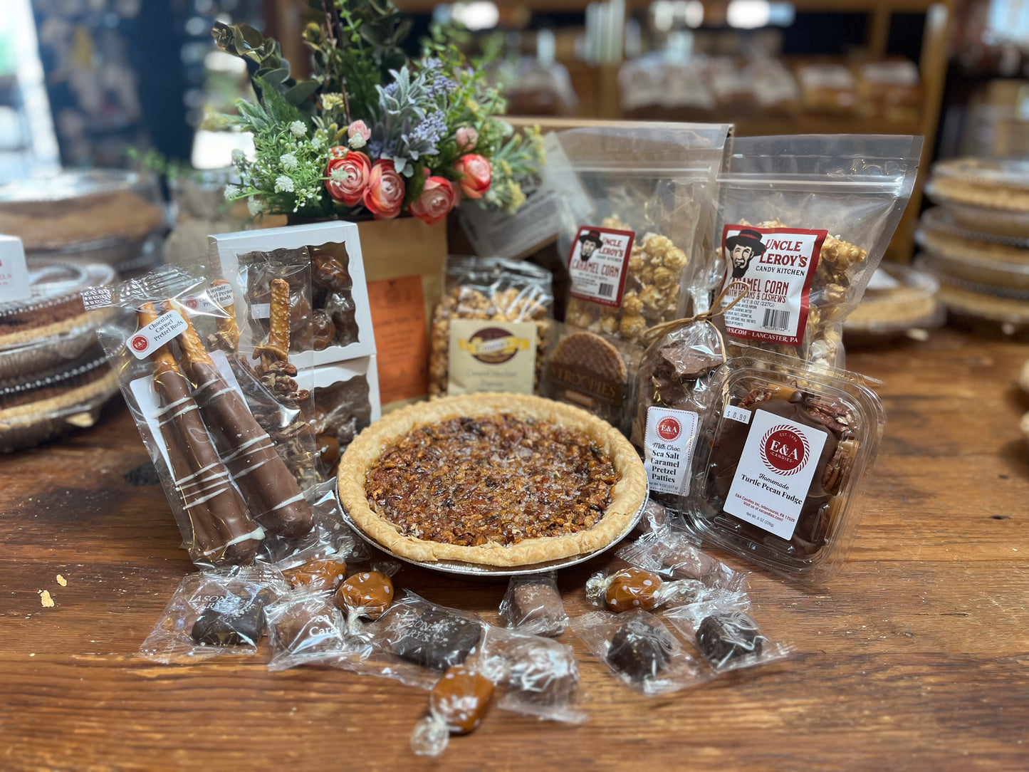 Salted Caramel Pecan Pie from MIller's Bakery in Lancaster County PA. Surrounded by more caramel items.
